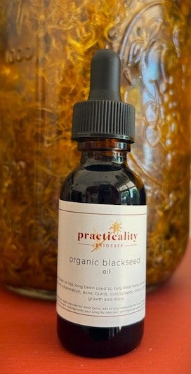 Cold-pressed black seed oil product photograph