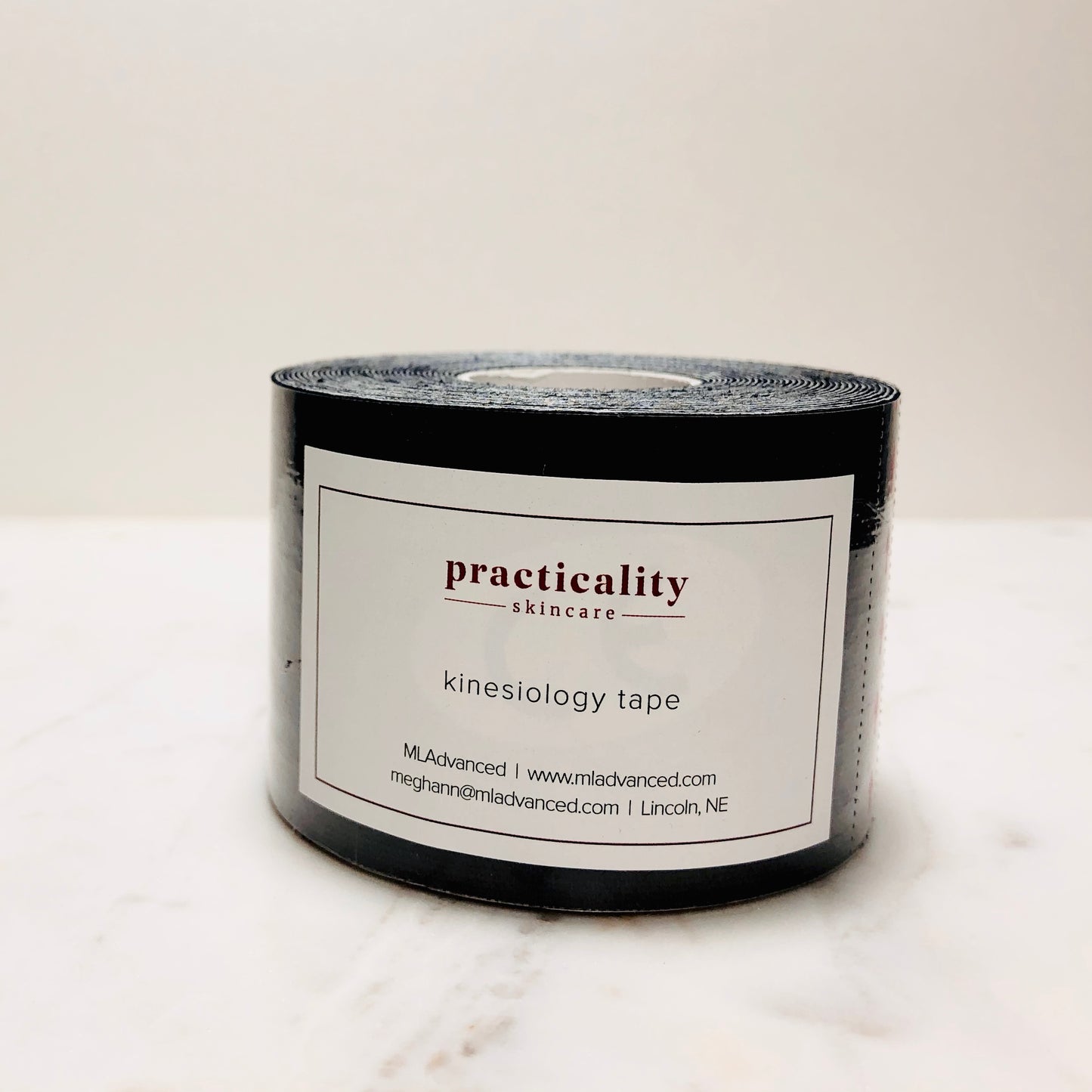 Roll of kinesiology tape for professional bodywork use