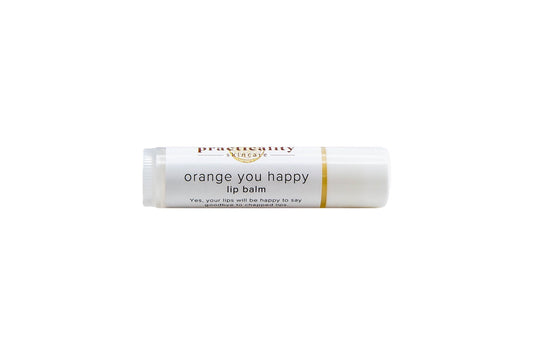Practicality Orange You Happy Lip Balm tube on a clean white background
