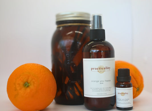 Practicality Orange You Happy aromatic body oil product photograph