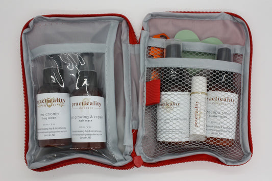 Practicality travel-size skincare and body-care products arranged as a gift kit